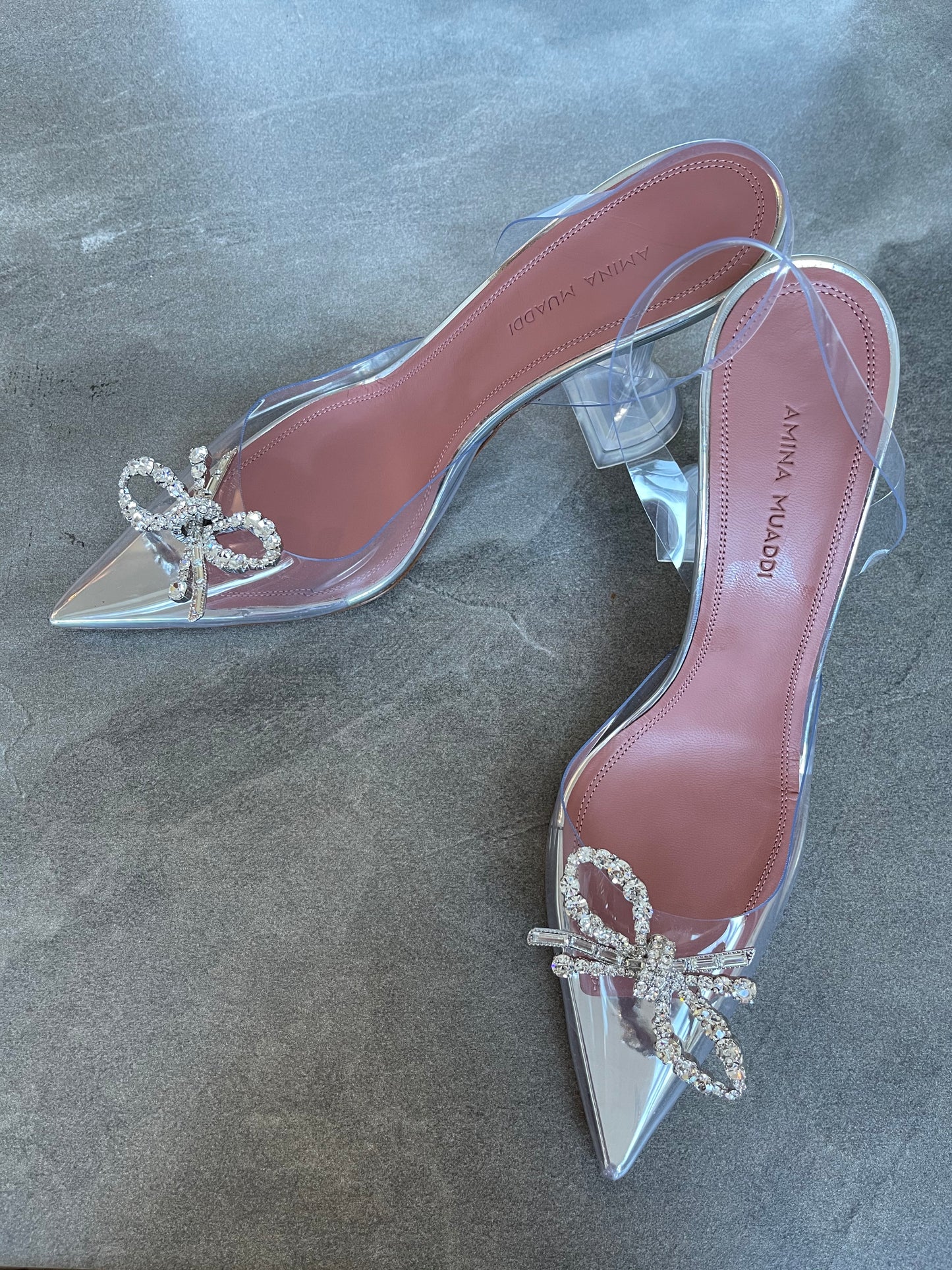 Amina Muaddi Rosie PVC Clear Transparent Bow Crystal Embellished Pumps