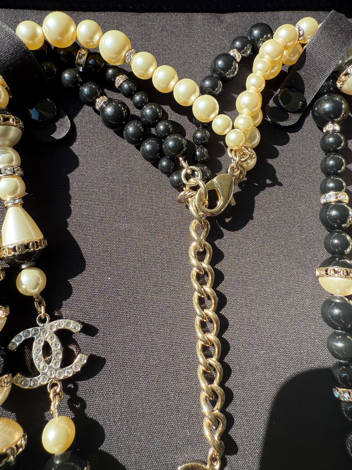 CHANEL 2021A GOLD TONE CC LOGO WHITE/BLACK PEARLS CRYSTAL BALLS TRIPLE LONG NECKLACE