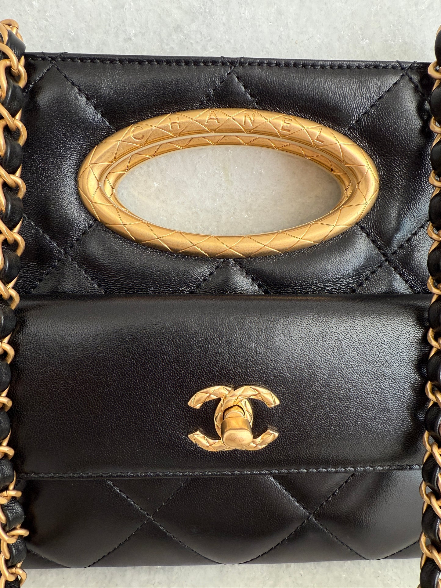 Chanel Quilted Black Lambskin Leather Chain Handle Pocket Gold Tone CC Logo Shoulder Clutch Purse
