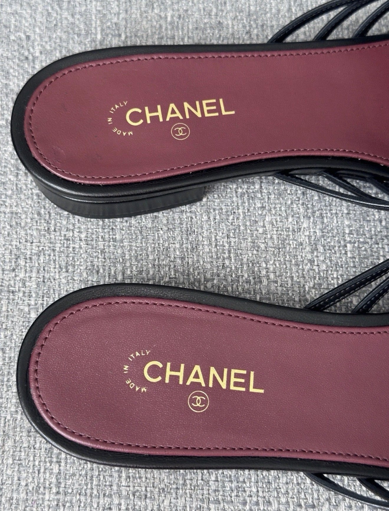 Chanel 2026 Métiers d'Art Blazy Black Leather Strappy Gold CC Logo Flat Sandals Slides