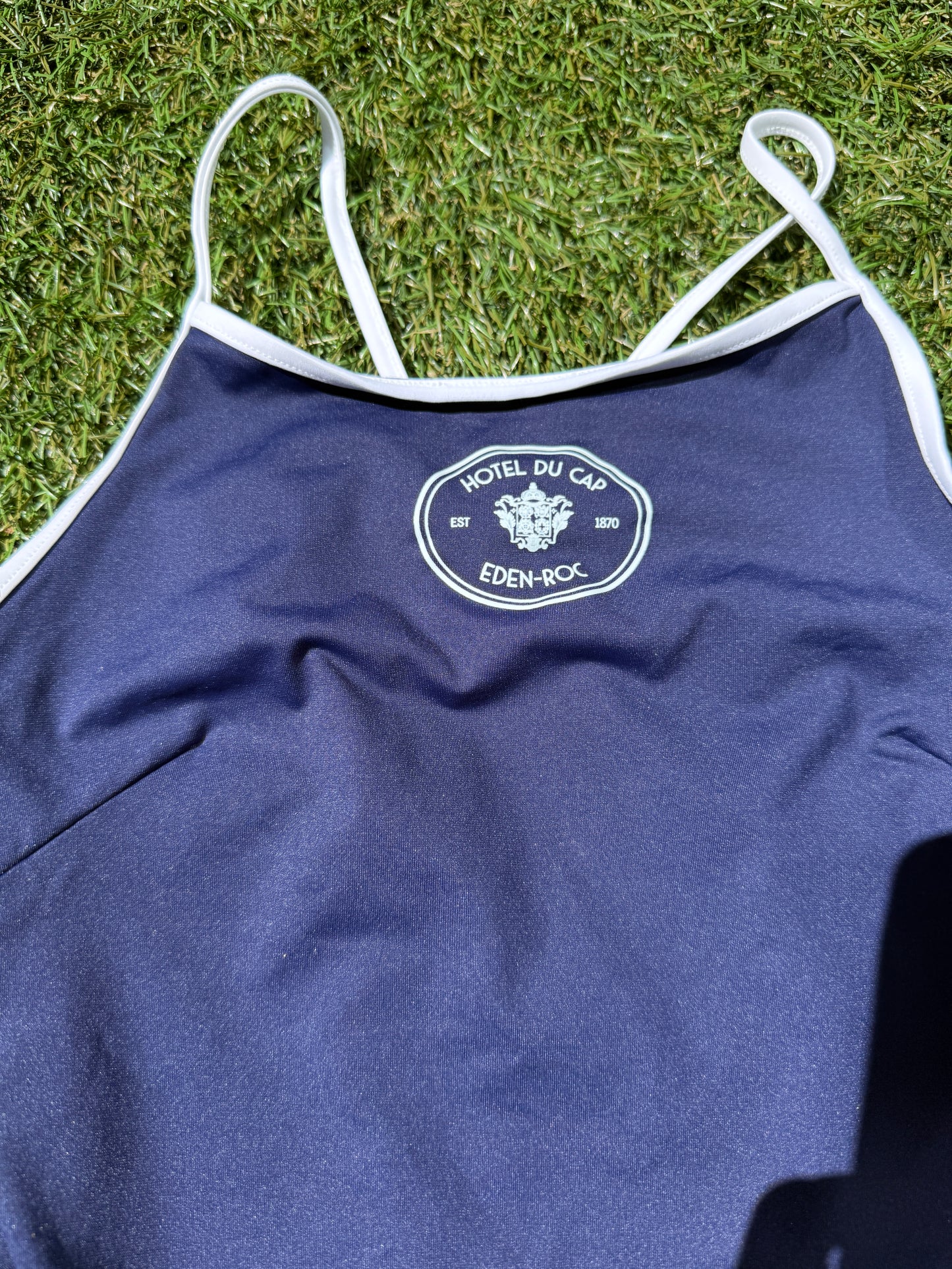 Sporty and Rich Eden-Roc Hotel Du Cap Navy Blue Crest One Piece Swimsut