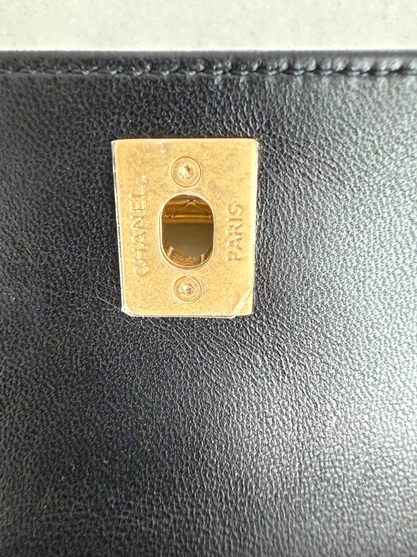 Chanel Quilted Black Lambskin Leather Chain Handle Pocket Gold Tone CC Logo Shoulder Clutch Purse