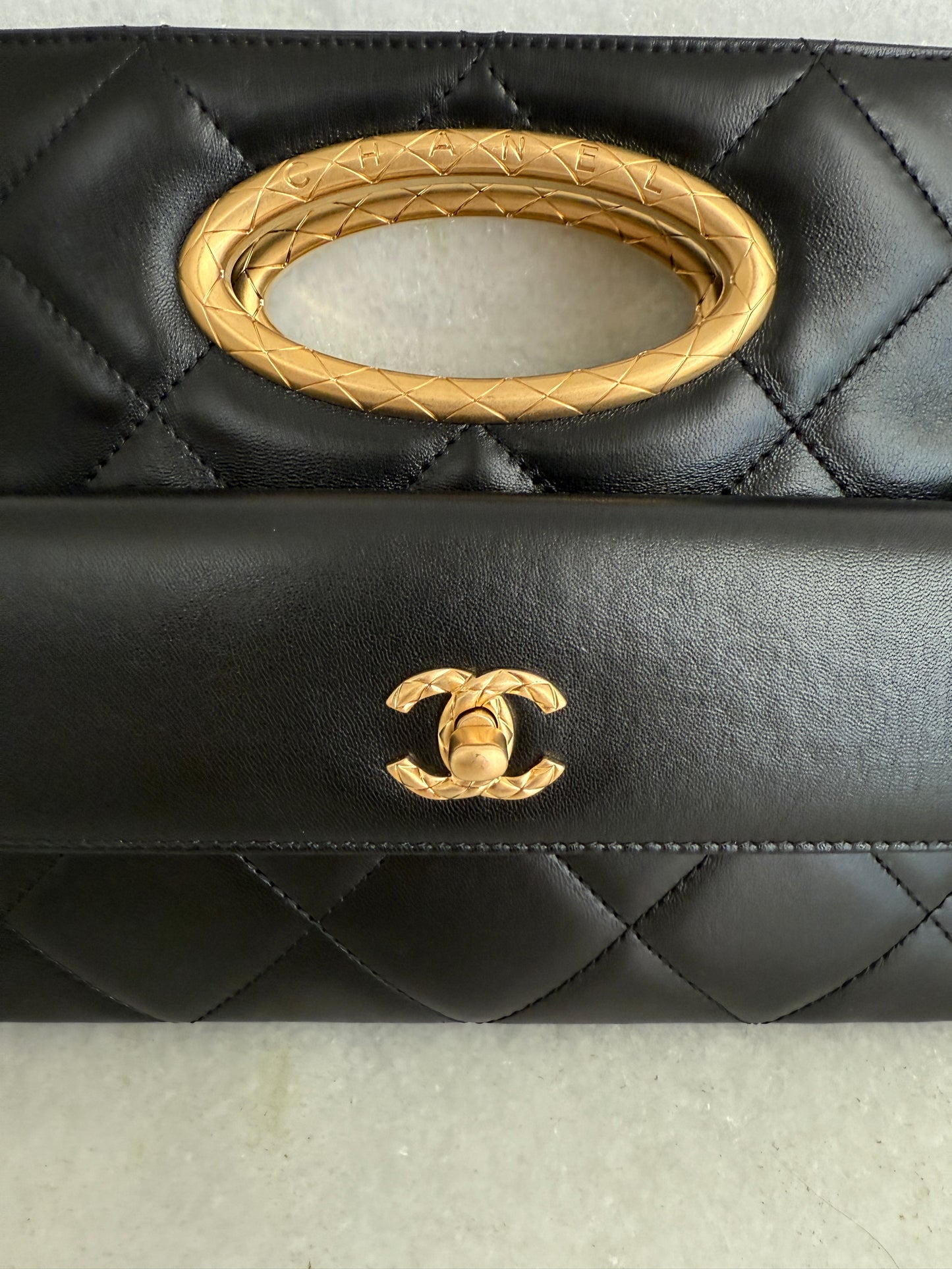 Chanel Quilted Black Lambskin Leather Chain Handle Pocket Gold Tone CC Logo Shoulder Clutch Purse