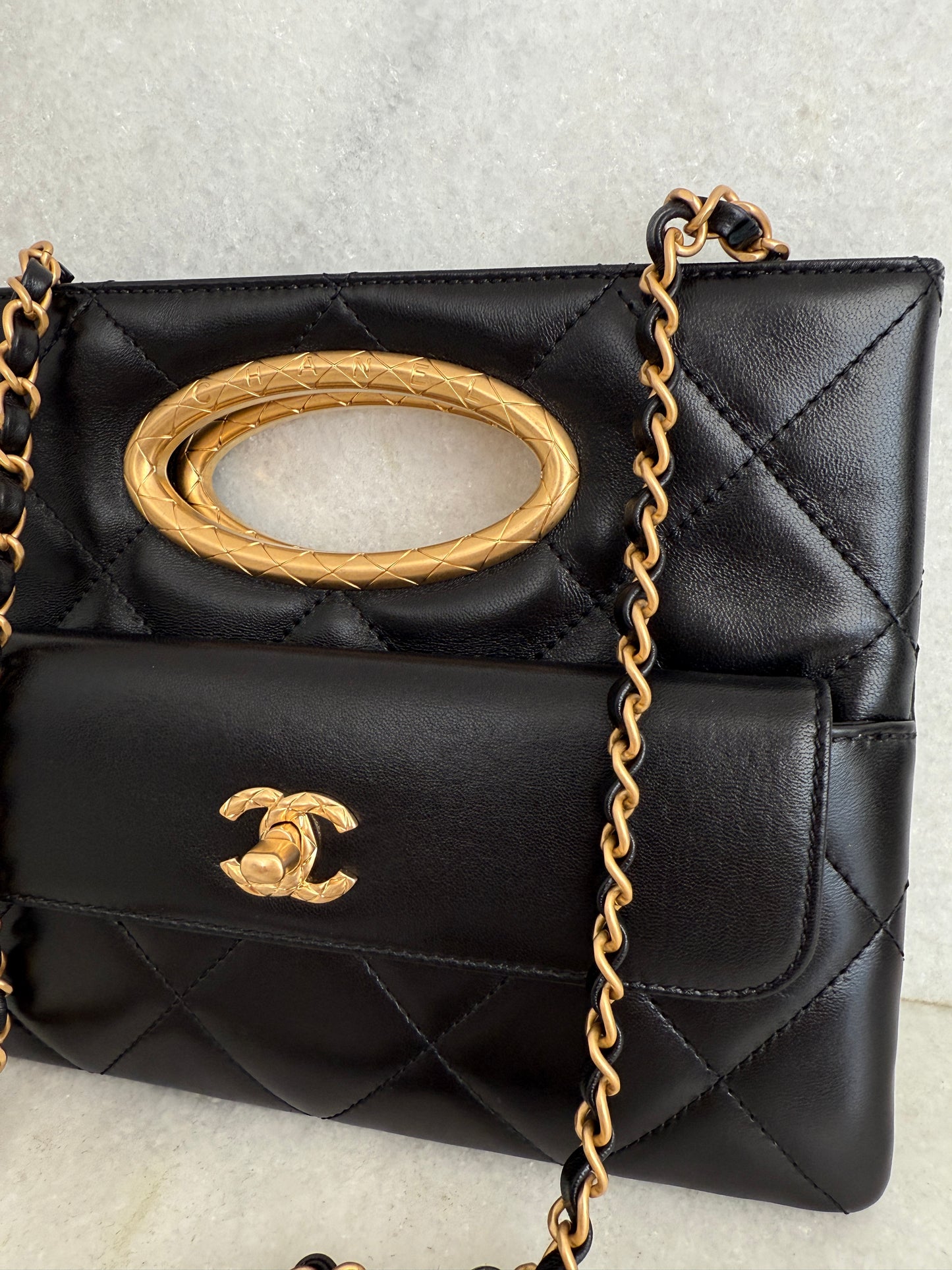 Chanel Quilted Black Lambskin Leather Chain Handle Pocket Gold Tone CC Logo Shoulder Clutch Purse