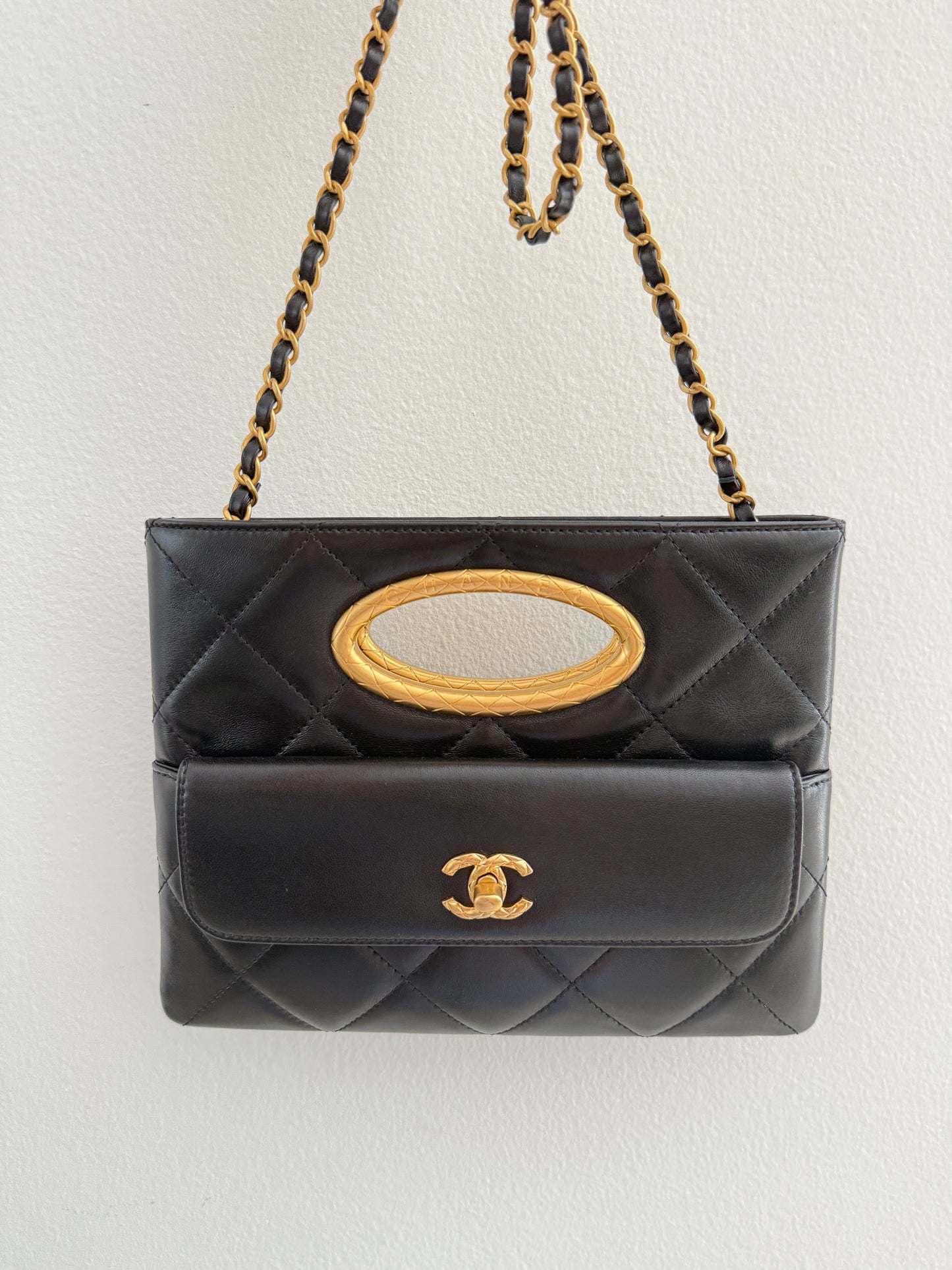 Chanel Quilted Black Lambskin Leather Chain Handle Pocket Gold Tone CC Logo Shoulder Clutch Purse