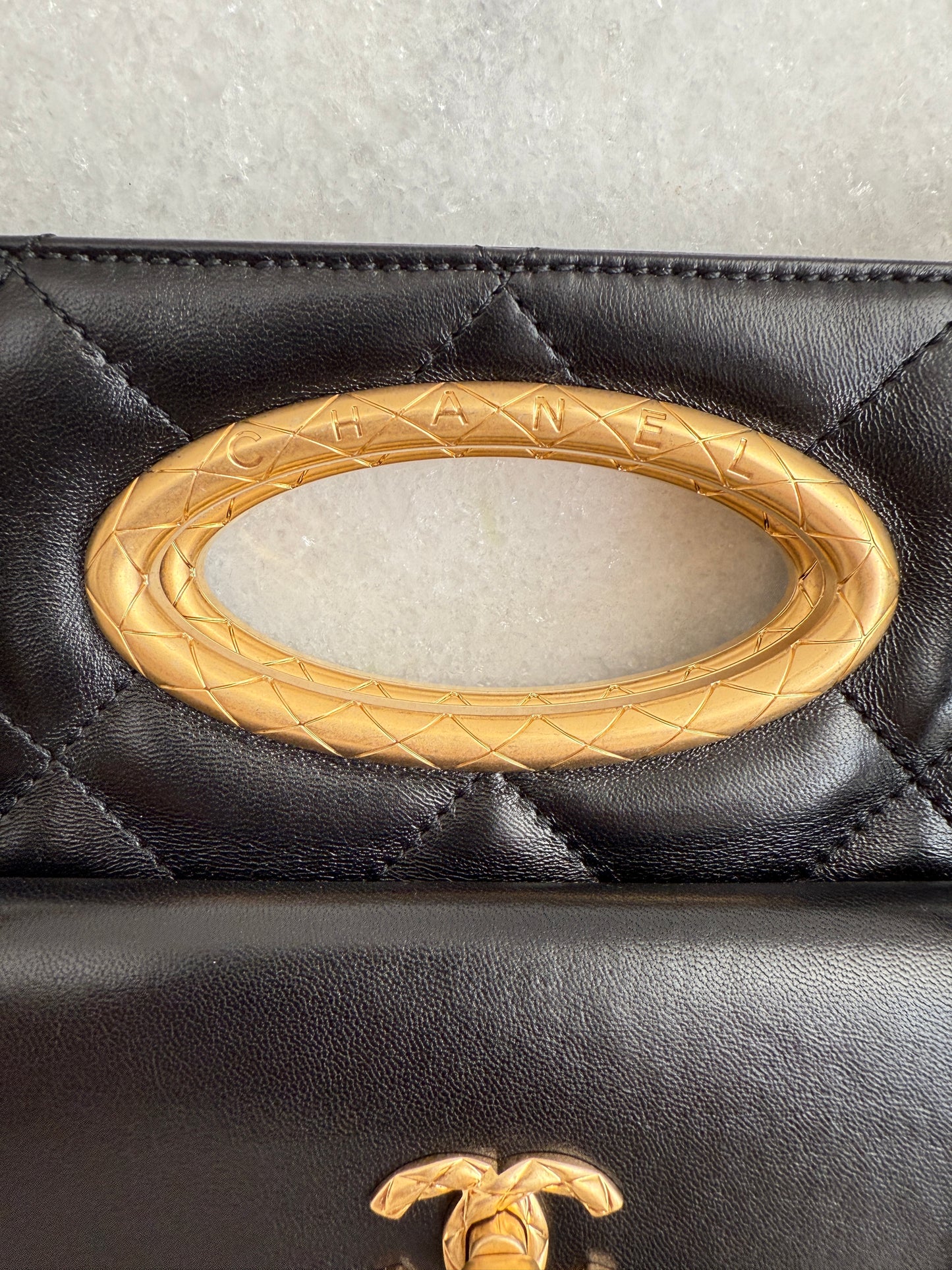 Chanel Quilted Black Lambskin Leather Chain Handle Pocket Gold Tone CC Logo Shoulder Clutch Purse