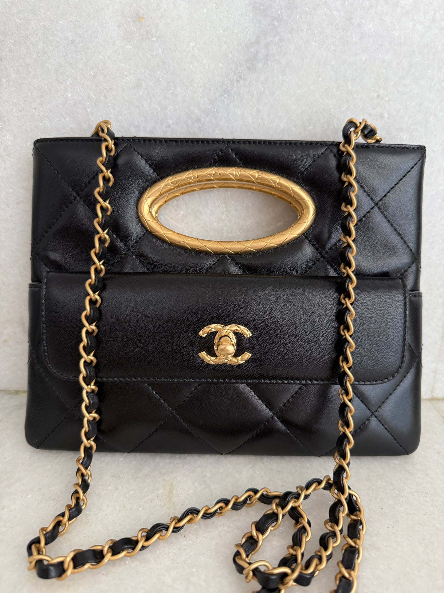 Chanel Quilted Black Lambskin Leather Chain Handle Pocket Gold Tone CC Logo Shoulder Clutch Purse