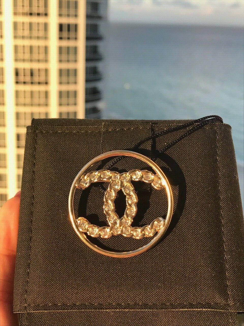 CHANEL 2019 GOLDEN TONE CC LOGO WHITE CRYSTALS ROUND BROOCH PIN CHARM