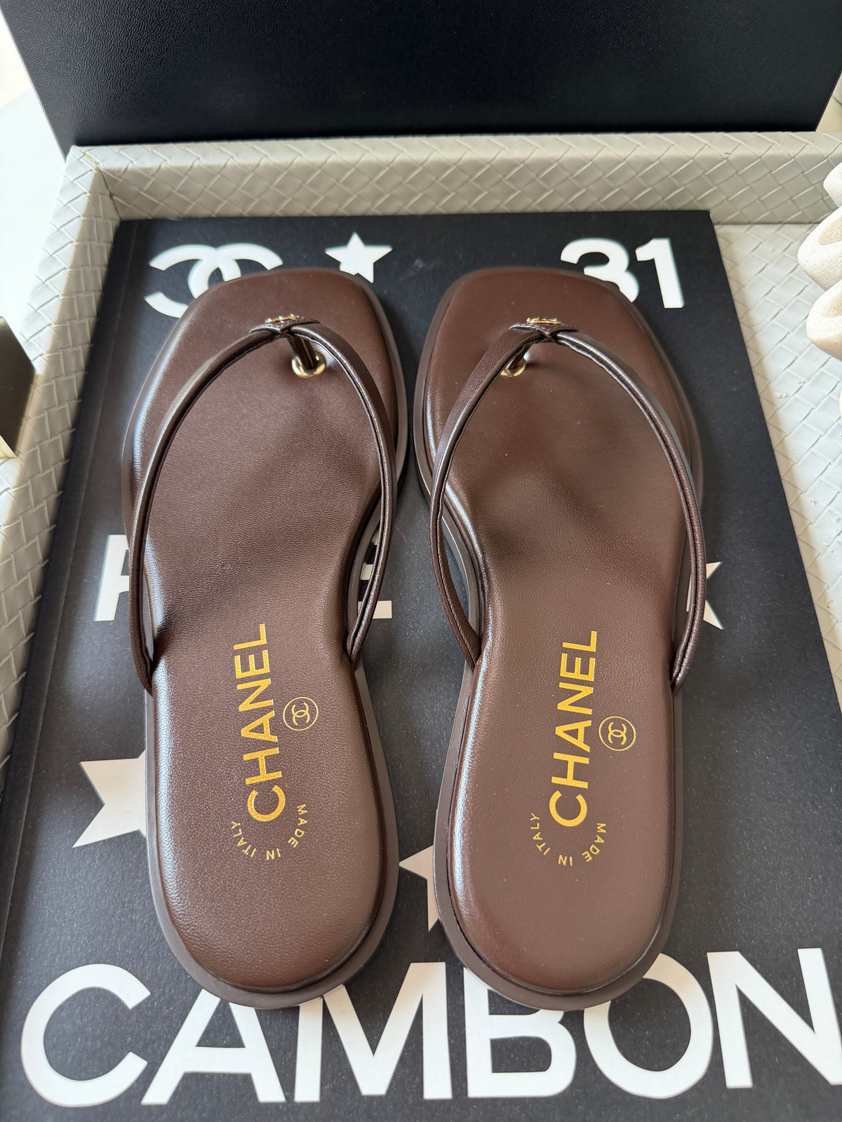 Chanel 2026 MÉTIERS D’ART Brown Leather Gold CC Logo Flip Flops Slides Flat Sandals Thongs 26A