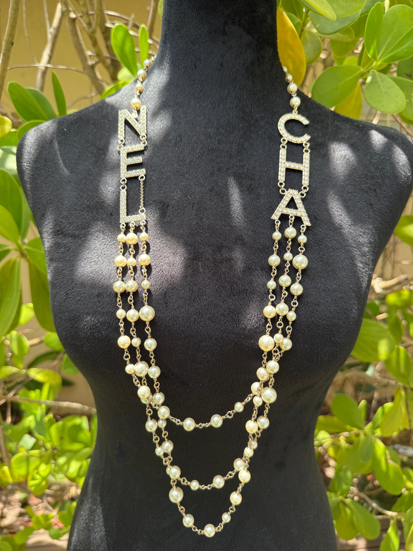 CHANEL 2019S GOLDEN TONE CHA NEL LETTERS LOGO WITH CRYSTALS PEARLS LONG NECKLACE