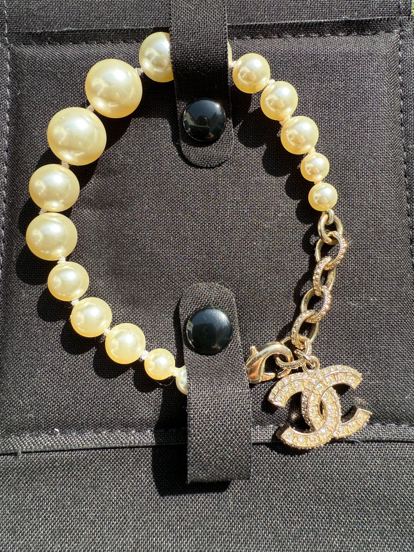 Chanel 19V Graduated Pearl Pearls Crystal Crystals CC Logo Charm Pendant Gold Tone Bracelet
