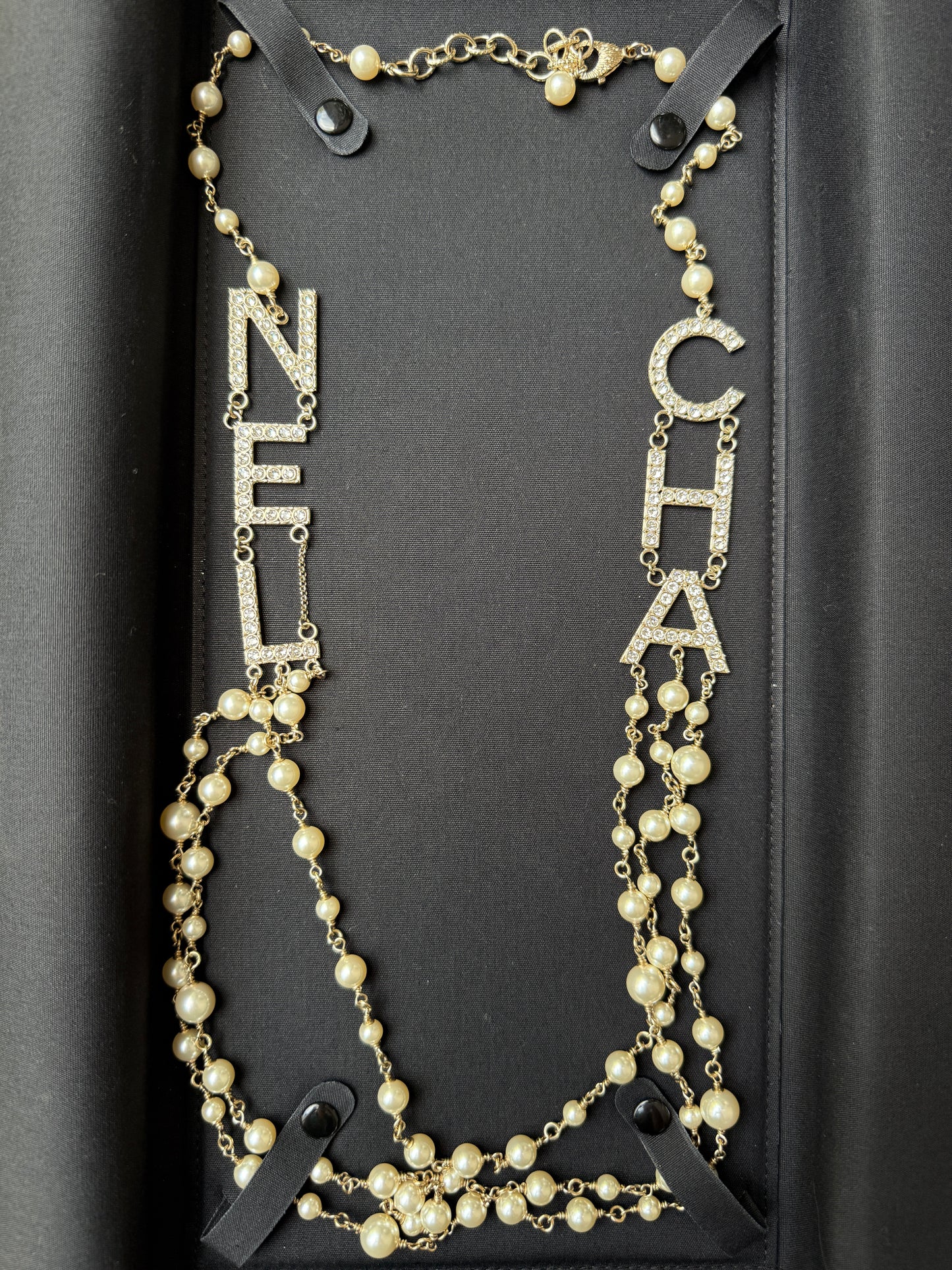CHANEL 2019S GOLDEN TONE CHA NEL LETTERS LOGO WITH CRYSTALS PEARLS LONG NECKLACE