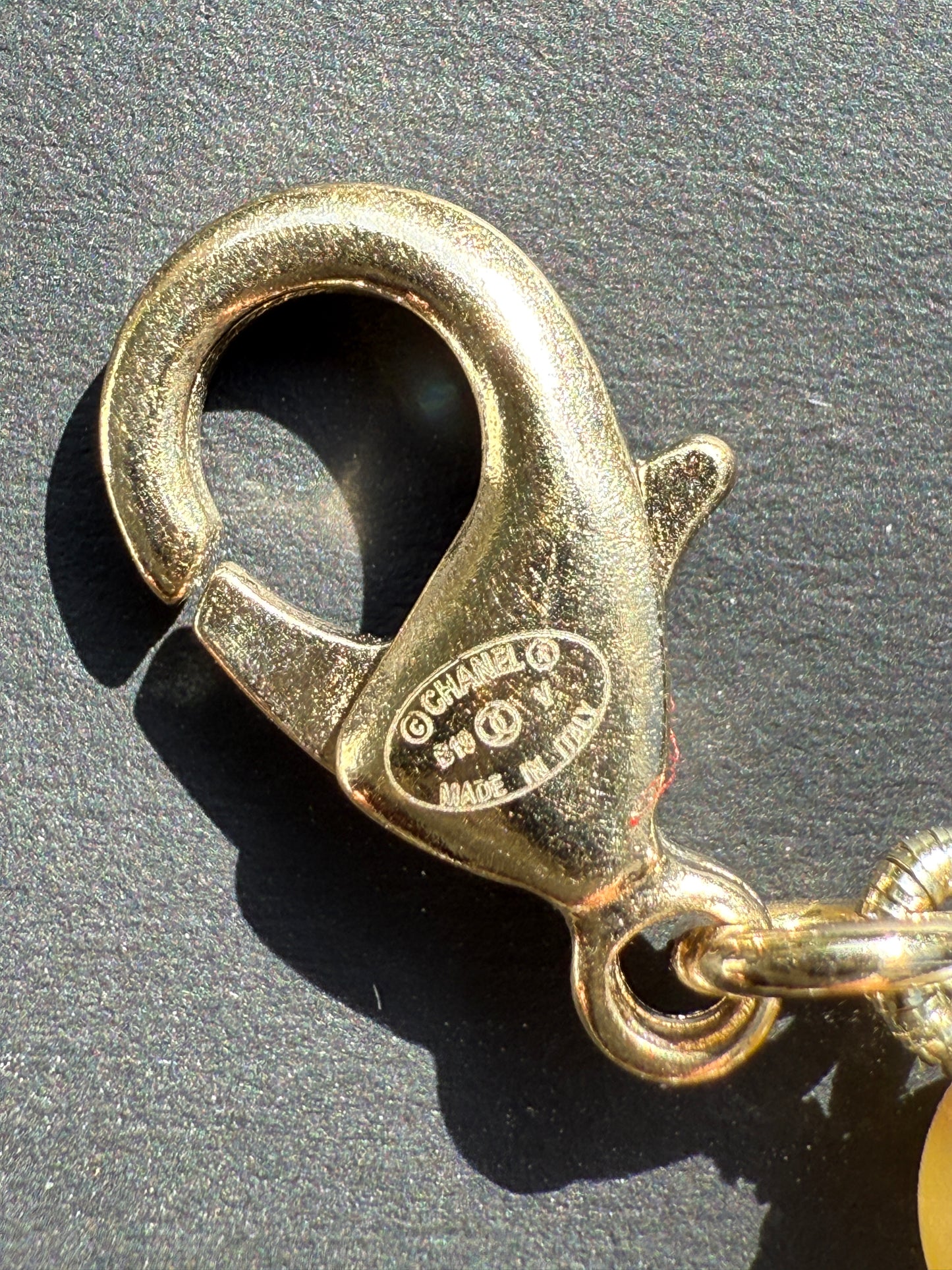 Chanel 19V Graduated Pearl Pearls Crystal Crystals CC Logo Charm Pendant Gold Tone Bracelet