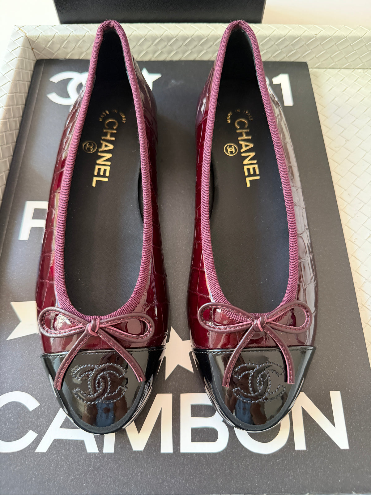 Chanel 26A Burgundy Croc Embossed Patent Metiers d’Art Black Cap Toe Ballet Ballerina Flats