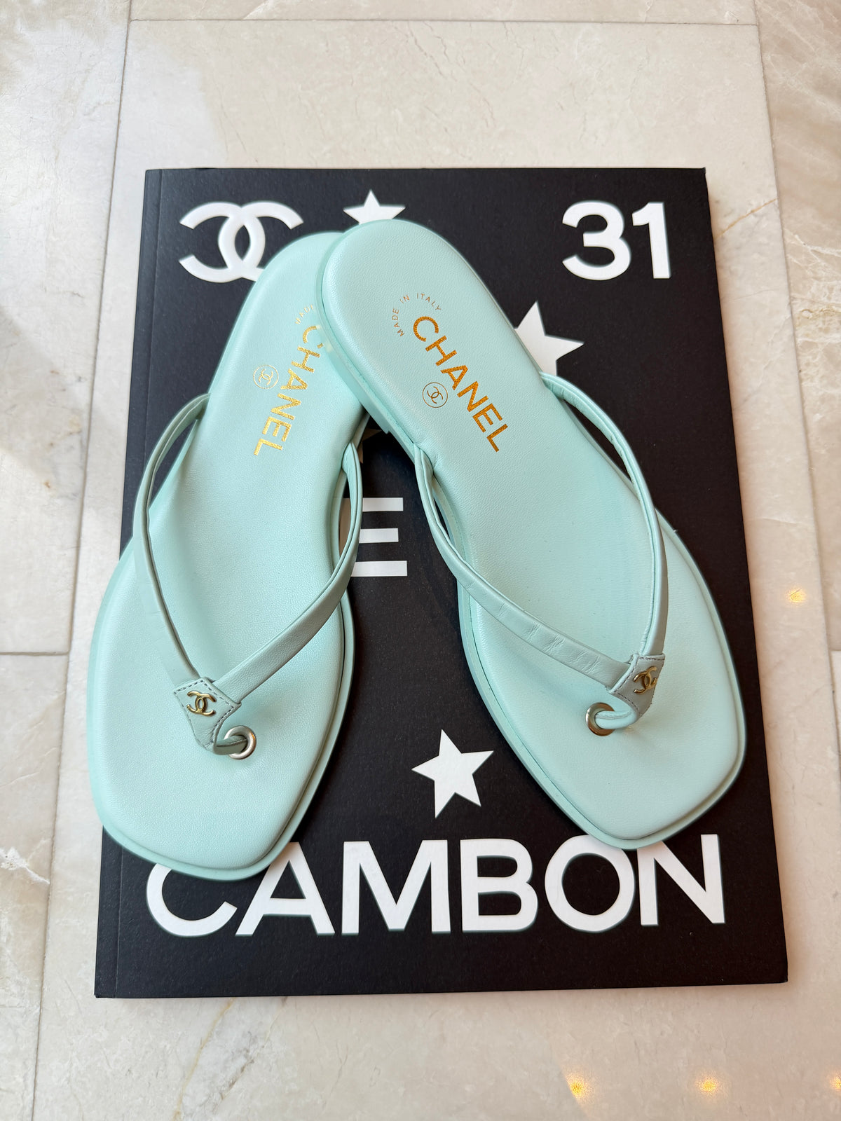 Chanel 2026 MÉTIERS D’ART Turquoise Leather Gold CC Logo Flip Flops Slides Flat Sandals Thongs