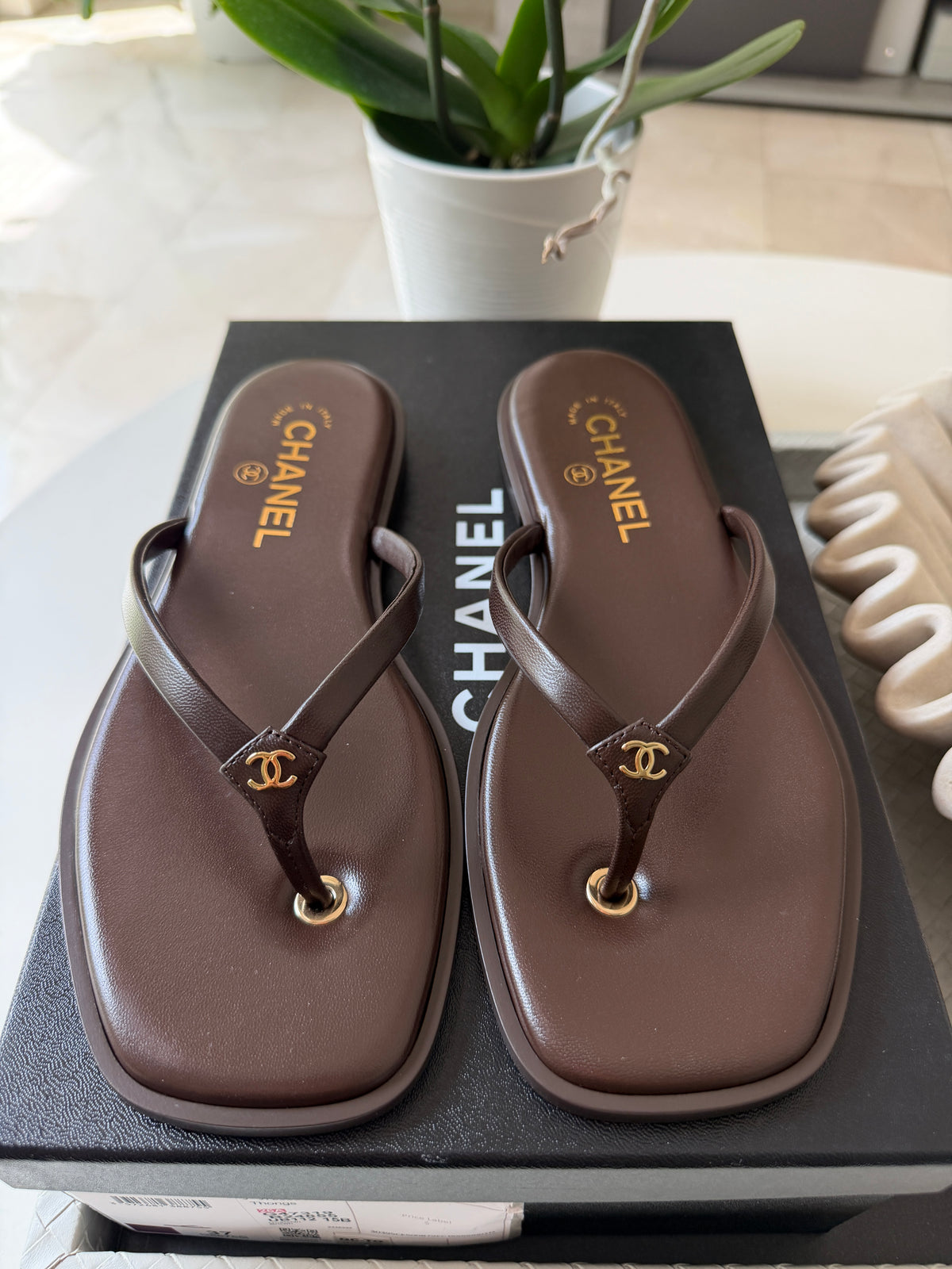 Chanel 2026 MÉTIERS D’ART Brown Leather Gold CC Logo Flip Flops Slides Flat Sandals Thongs 26A