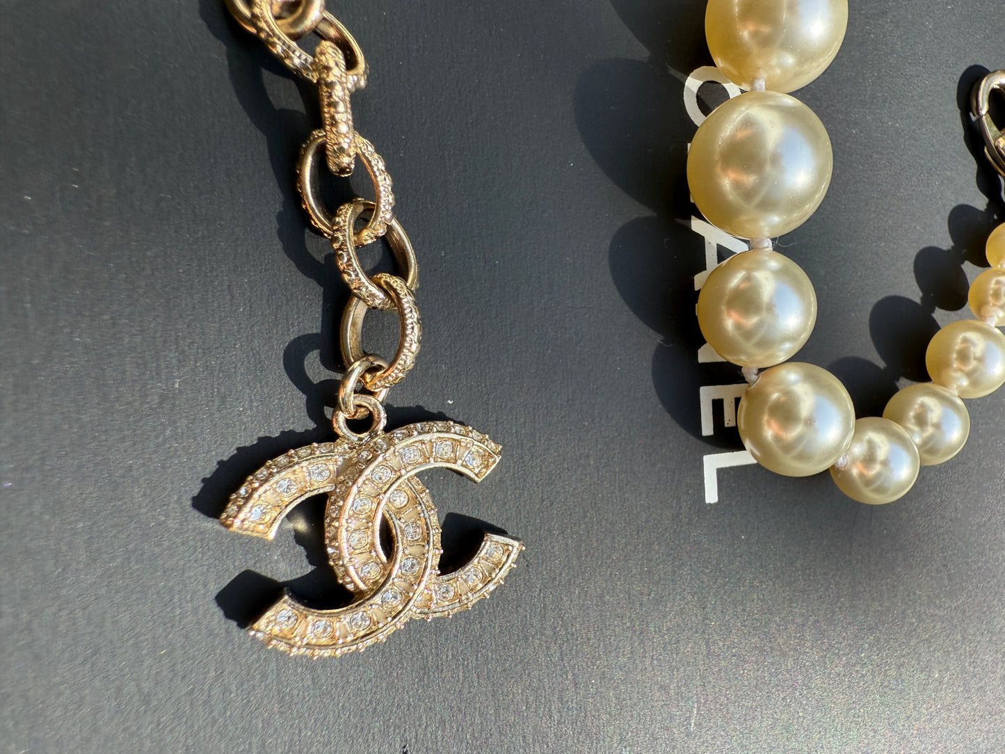 Chanel 19V Graduated Pearl Pearls Crystal Crystals CC Logo Charm Pendant Gold Tone Bracelet