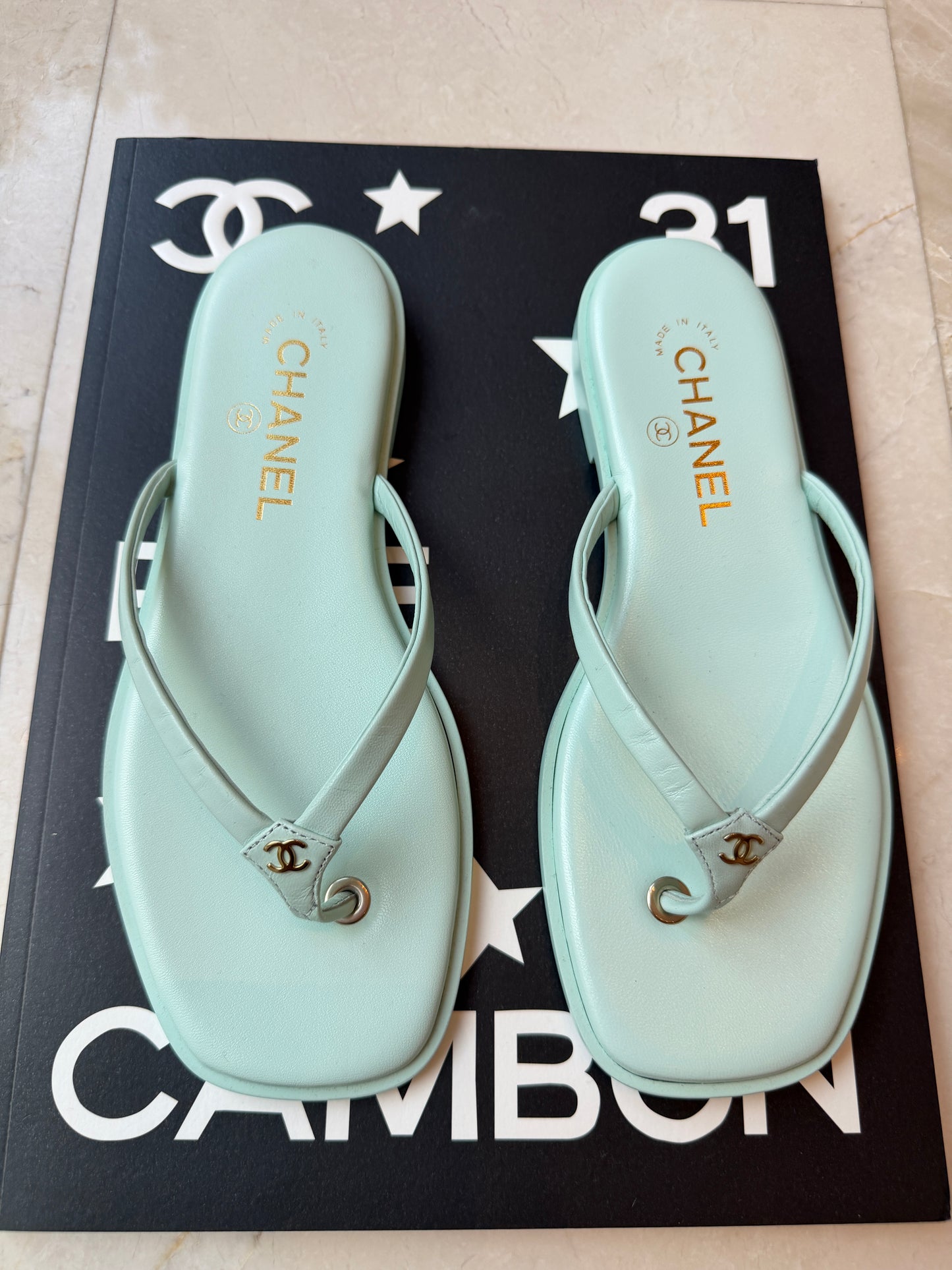 Chanel 2026 MÉTIERS D’ART Turquoise Leather Gold CC Logo Flip Flops Slides Flat Sandals Thongs