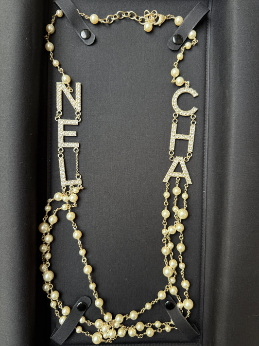 CHANEL 2019S GOLDEN TONE CHA NEL LETTERS LOGO WITH CRYSTALS PEARLS LONG NECKLACE