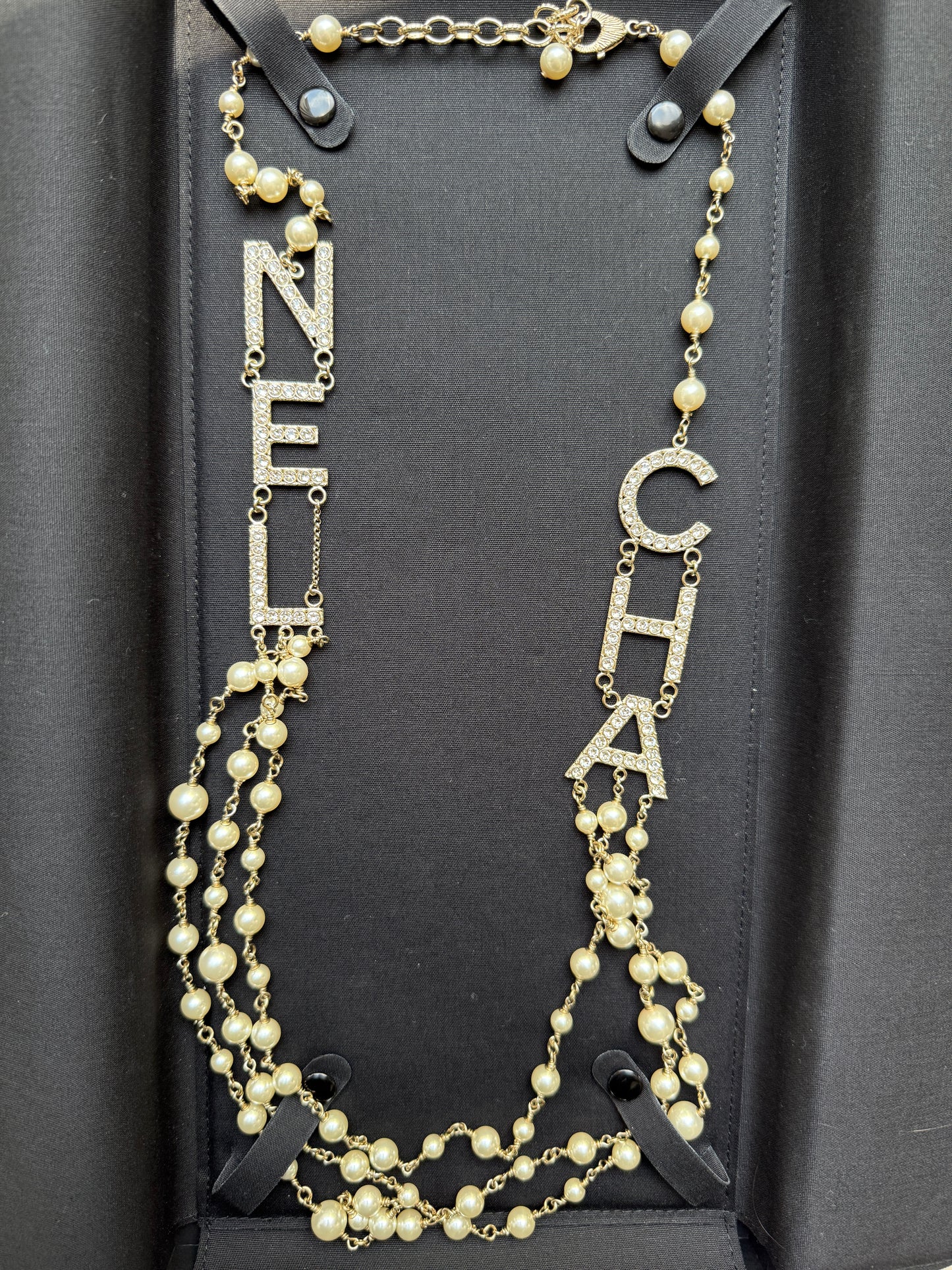 CHANEL 2019S GOLDEN TONE CHA NEL LETTERS LOGO WITH CRYSTALS PEARLS LONG NECKLACE