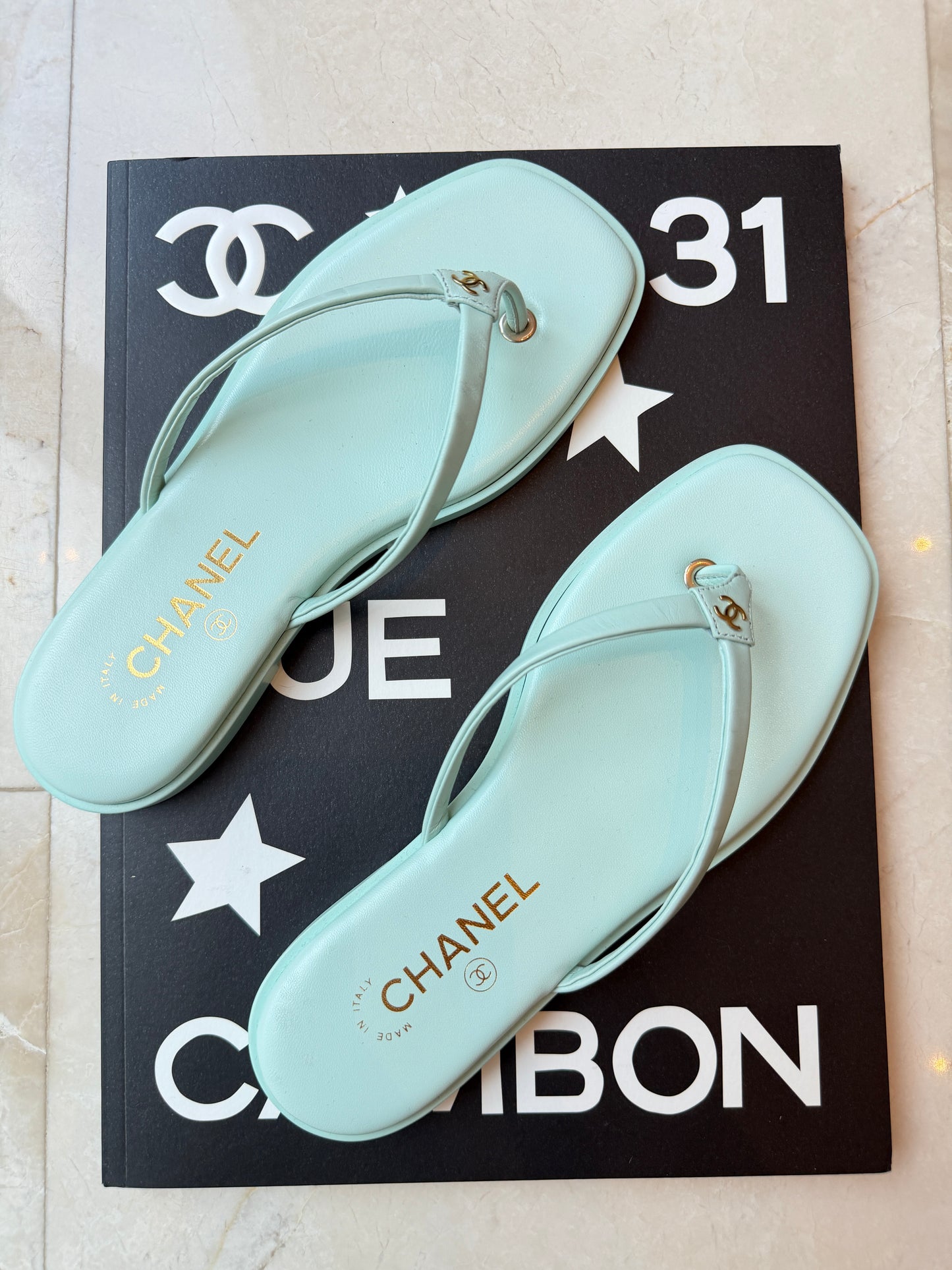 Chanel 2026 MÉTIERS D’ART Turquoise Leather Gold CC Logo Flip Flops Slides Flat Sandals Thongs