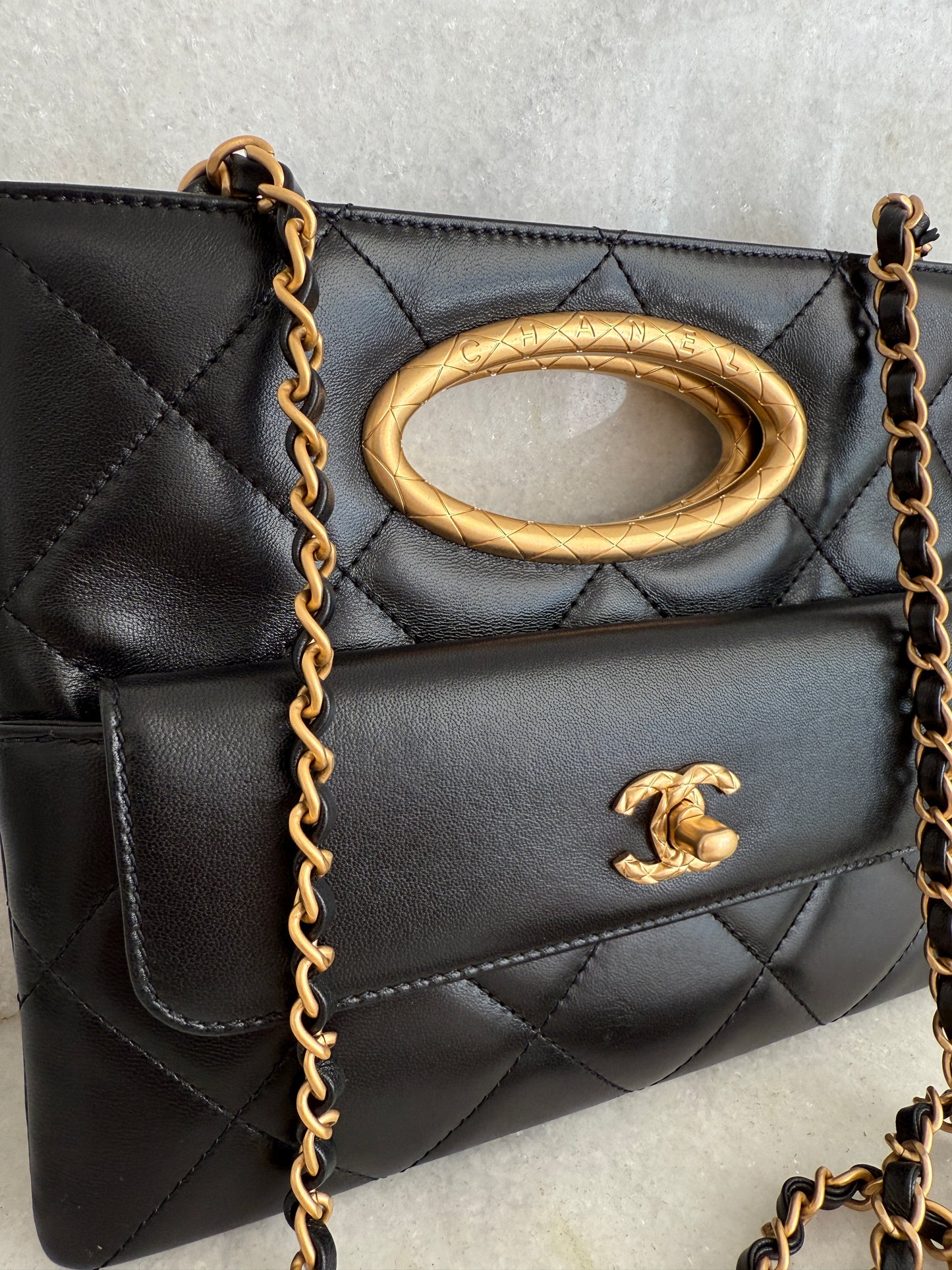 Chanel Quilted Black Lambskin Leather Chain Handle Pocket Gold Tone CC Logo Shoulder Clutch Purse