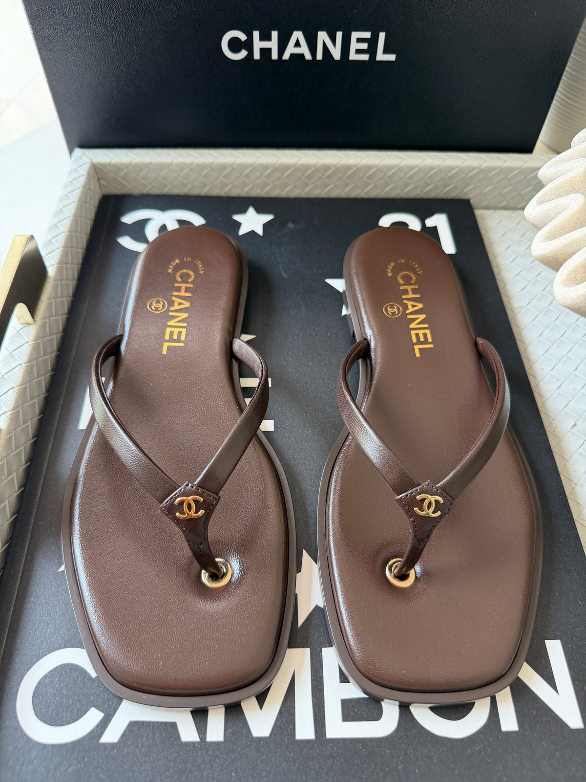 Chanel 2026 MÉTIERS D’ART Brown Leather Gold CC Logo Flip Flops Slides Flat Sandals Thongs 26A