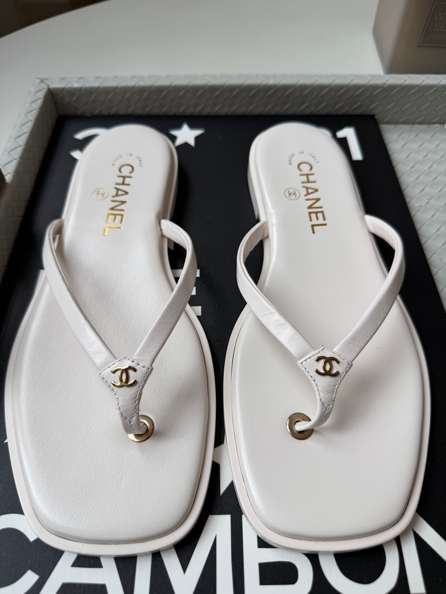 Chanel 2026 MÉTIERS D’ART Ivory White Leather Gold CC Logo Flip Flops Slides Flat Sandals Thongs