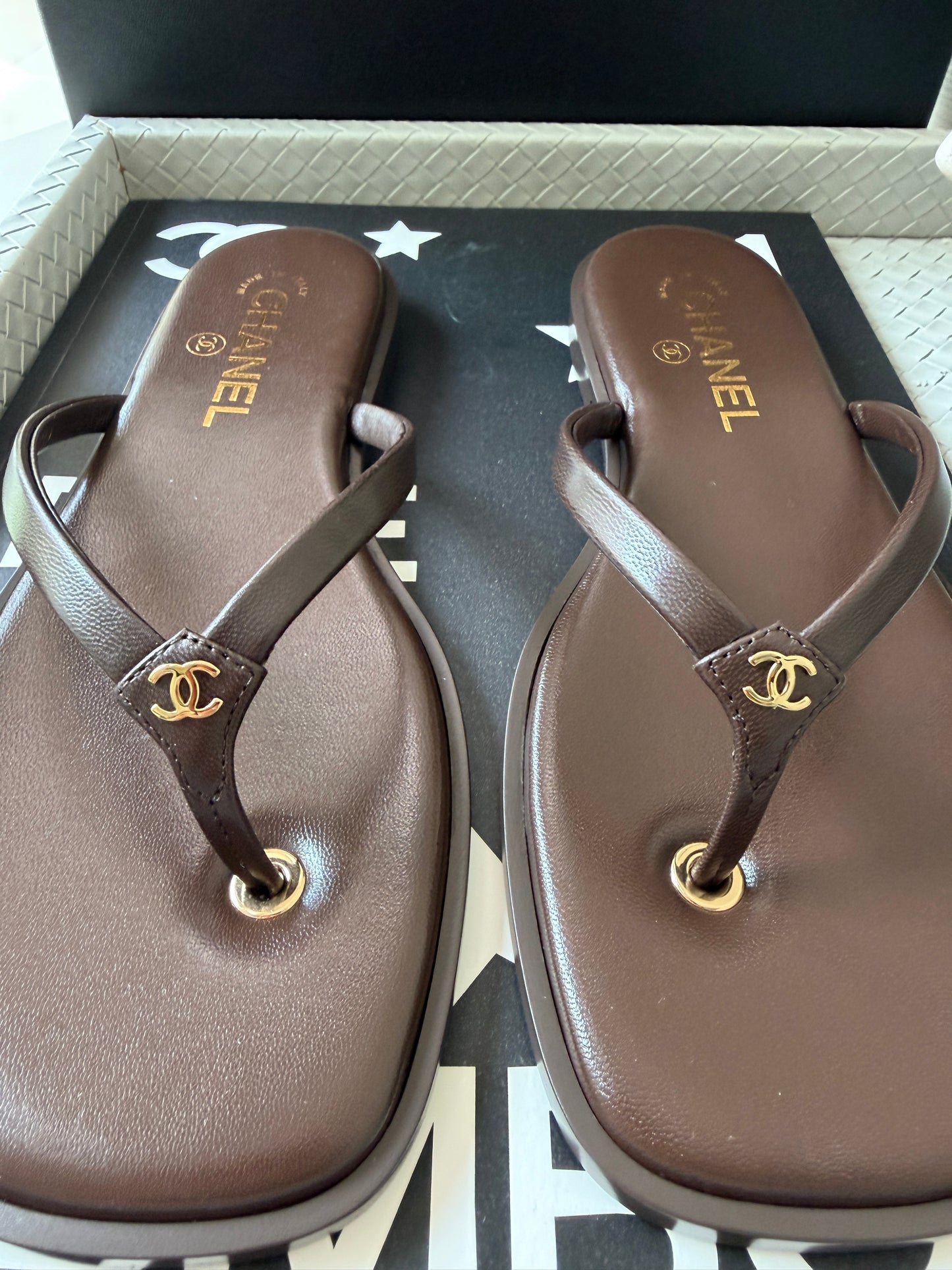 Chanel 2026 MÉTIERS D’ART Brown Leather Gold CC Logo Flip Flops Slides Flat Sandals Thongs 26A