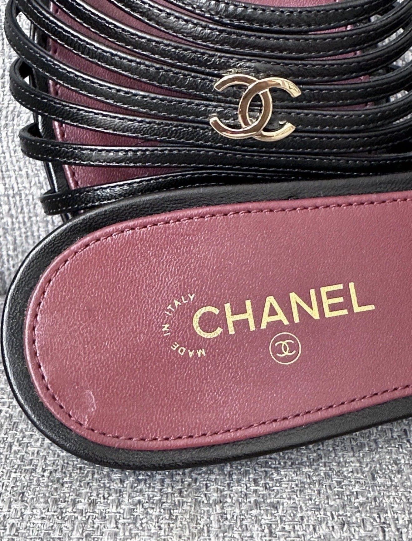 Chanel 2026 Métiers d'Art Blazy Black Leather Strappy Gold CC Logo Flat Sandals Slides