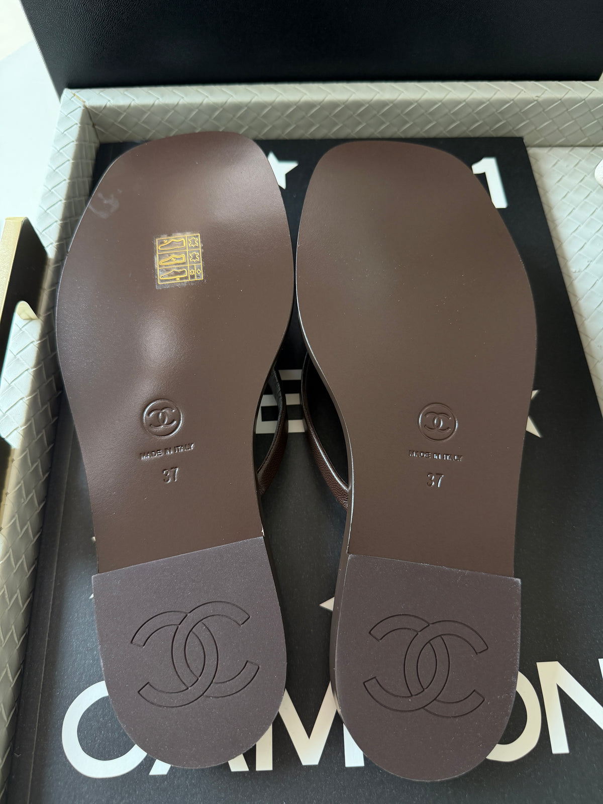 Chanel 2026 MÉTIERS D’ART Brown Leather Gold CC Logo Flip Flops Slides Flat Sandals Thongs 26A
