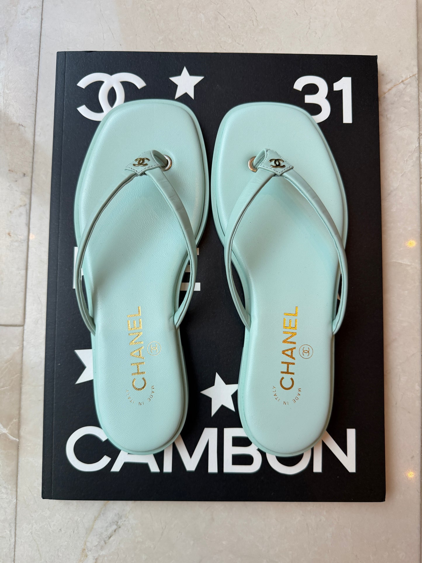 Chanel 2026 MÉTIERS D’ART Turquoise Leather Gold CC Logo Flip Flops Slides Flat Sandals Thongs