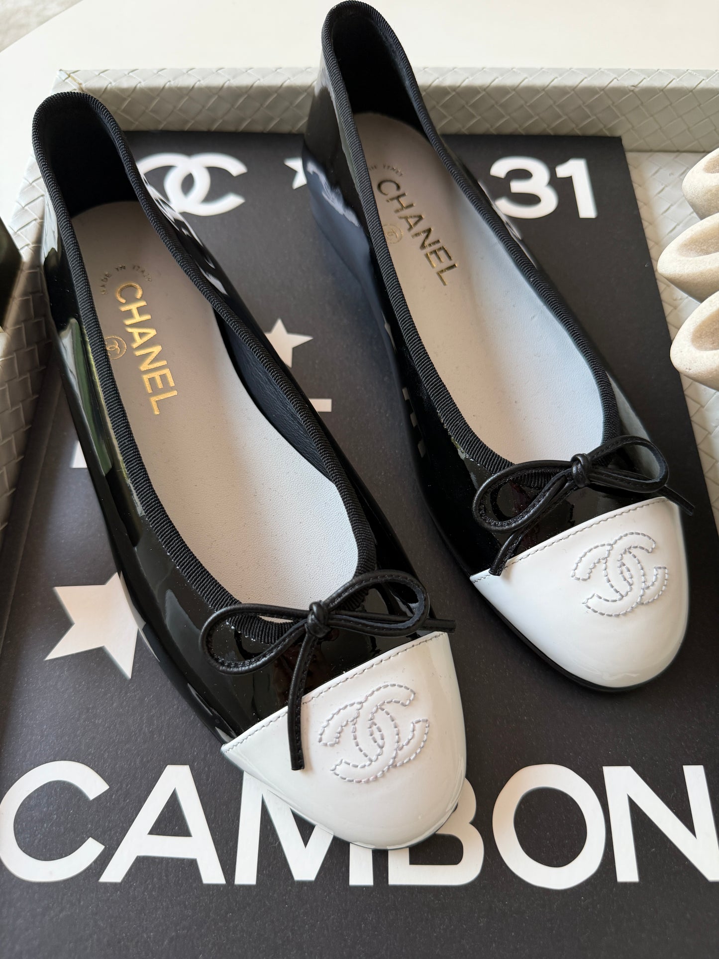 Chanel 26 Black Patent Leather White Cap Toe CC Logo Flat Ballet Ballerina Flats