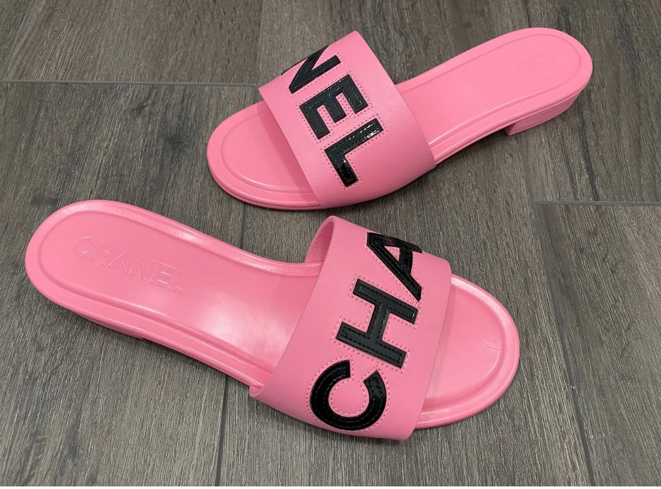 CHANEL CHA NEL LOGO PINK LEATHER FLAT SHOES SLIDES MULES – Miami Lux  Boutique