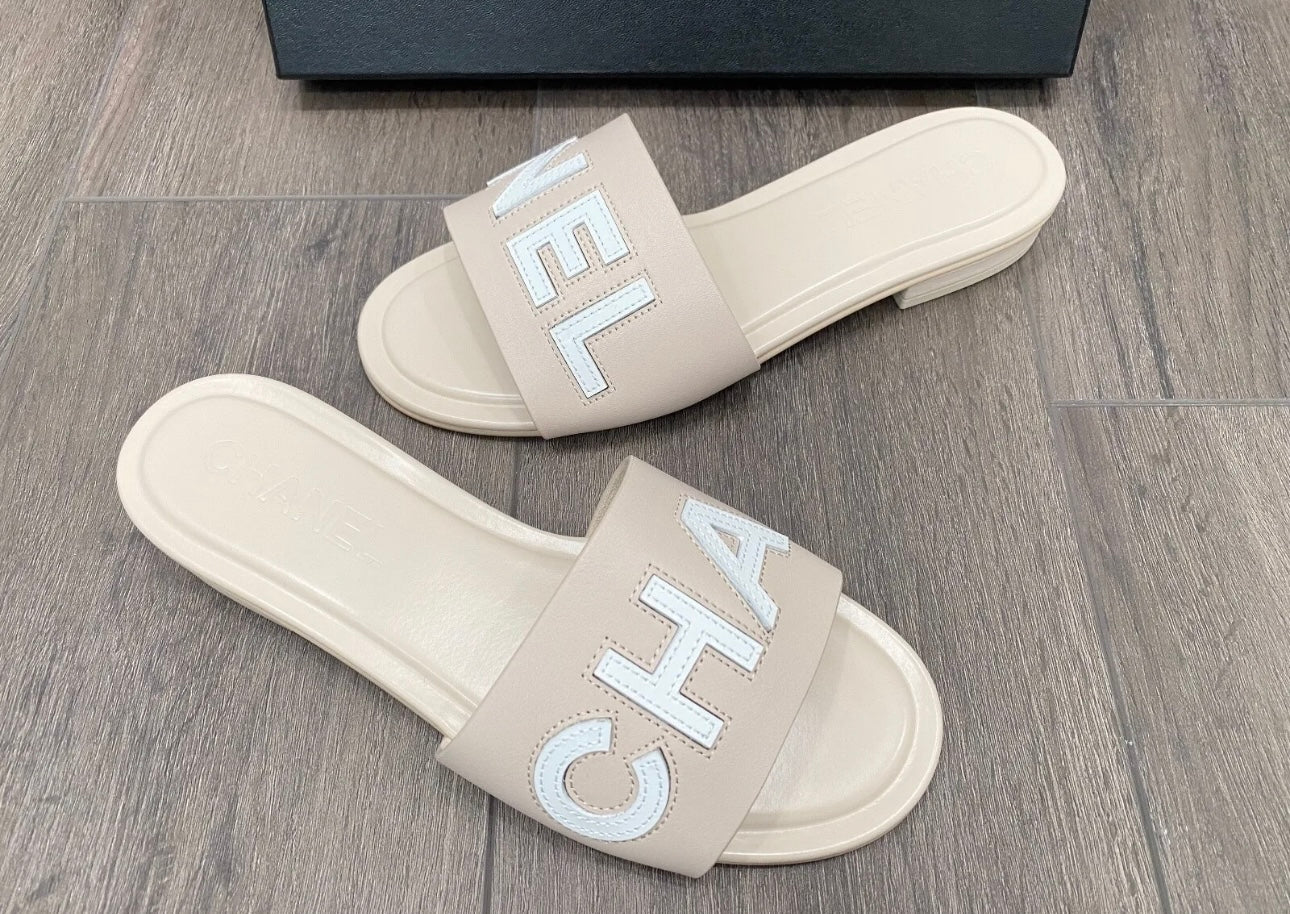 CHANEL CHA NEL LOGO BEIGE LEATHER FLAT SHOES SLIDES MULES