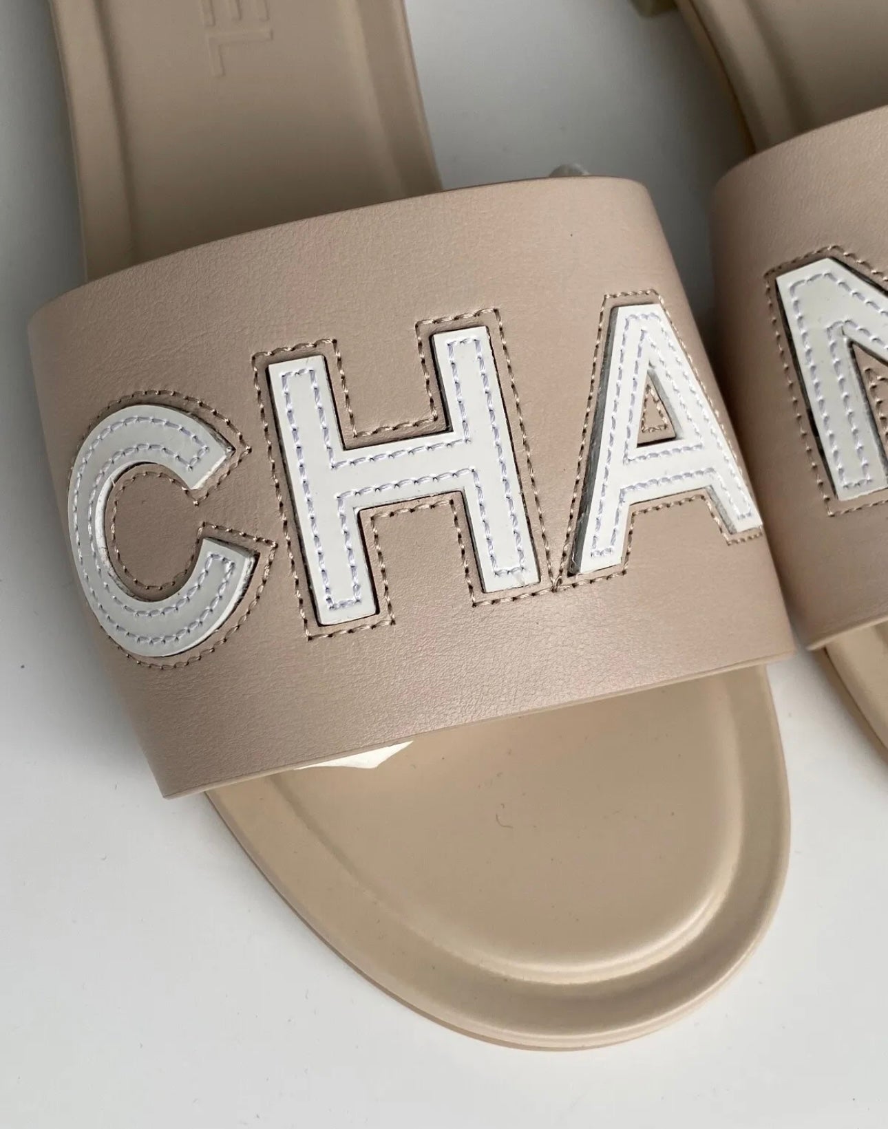 CHANEL CHA NEL LOGO BEIGE LEATHER FLAT SHOES SLIDES MULES – Miami Lux  Boutique