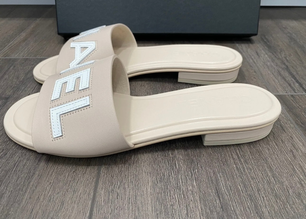 CHANEL CHA NEL LOGO BEIGE LEATHER FLAT SHOES SLIDES MULES