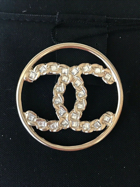 CHANEL 2019 GOLDEN TONE CC LOGO WHITE CRYSTALS ROUND BROOCH PIN CHARM