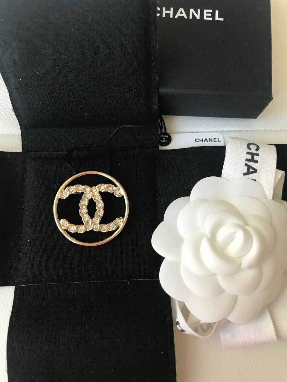 CHANEL 2019 GOLDEN TONE CC LOGO WHITE CRYSTALS ROUND BROOCH PIN CHARM